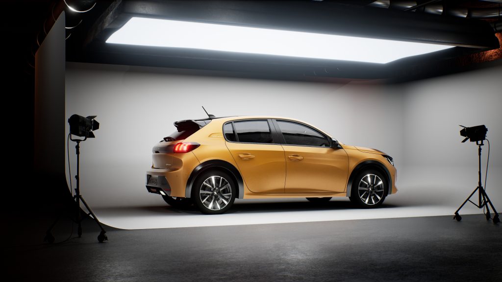 Peugeot 208 jaune de profil dans un studio photo